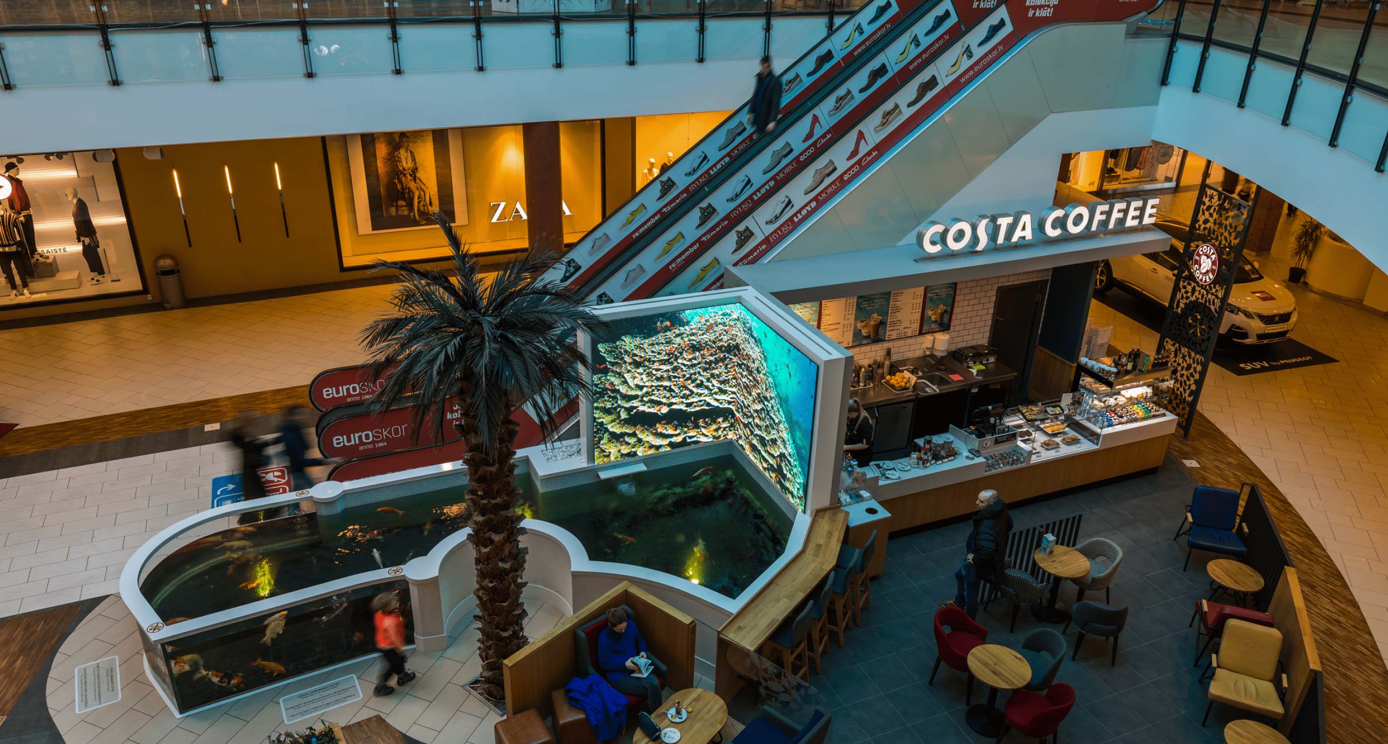 PALAMI Group LED Indoor High Quality Video Display Installed In Open Book Design In Shopping Center